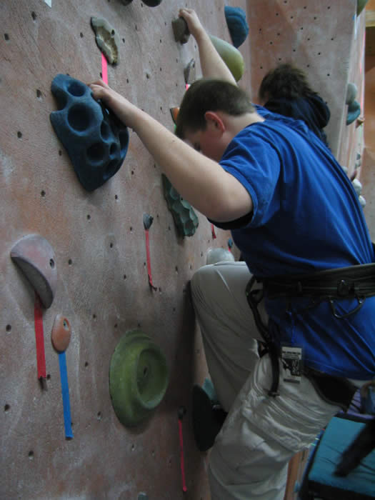 Picture of John rocking climbing - one of his favorite pastimes.